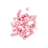 Décors perles roses comestibles 300 g