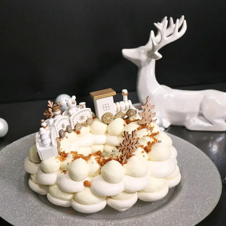 Petit train de Noël blanc sur pique