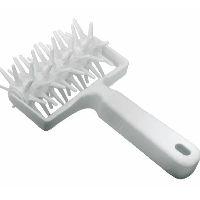 Rouleau pique pâte plastique 12 cm